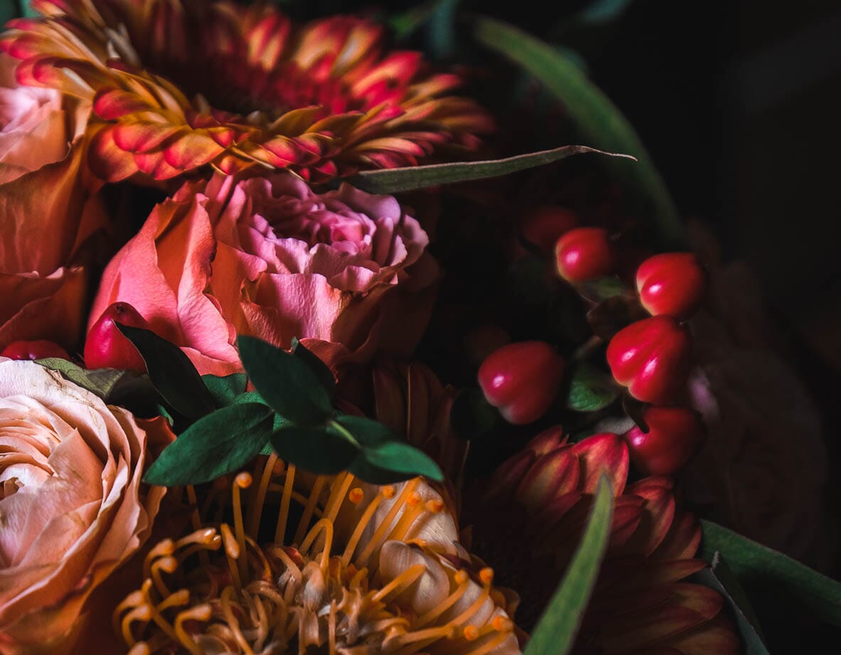 Rich red and orange colored DIY wedding flowers, perfect for fall and autumn bouquets and arrangements.