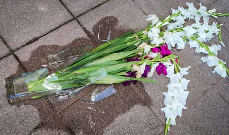 Broken vase with flowers