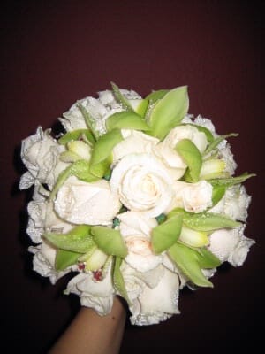 White Rose and Cymbidium orchid bouquet